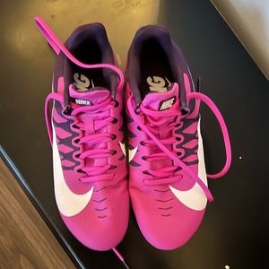 Hot pink Nike track running spikes